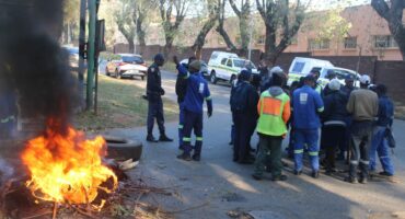 Contract workers gather outside Pikitup's Waterval depot during a protest over delayed permanent appointments on July 8, 2026, in Albertsville. Photo: Waydon Jacobs