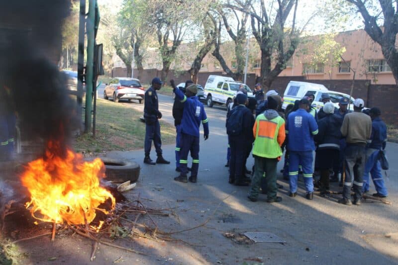 Contract workers gather outside Pikitup's Waterval depot during a protest over delayed permanent appointments on July 8, 2026, in Albertsville. Photo: Waydon Jacobs