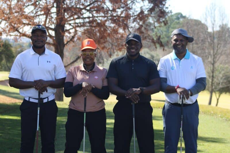 Professionals swapped pens for golf clubs to raise funds to help students access higher education.