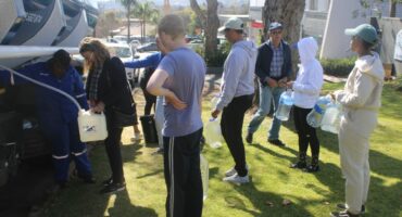 Residents wait their turn to fill containers from a Johannesburg Water tanker serving communities affected by the ongoing water crisis on July 19, 2026 in Northcliff. Photo: Waydon Jacobs