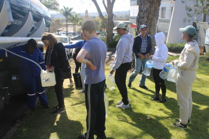 Residents wait their turn to fill containers from a Johannesburg Water tanker serving communities affected by the ongoing water crisis on July 19, 2026 in Northcliff. Photo: Waydon Jacobs