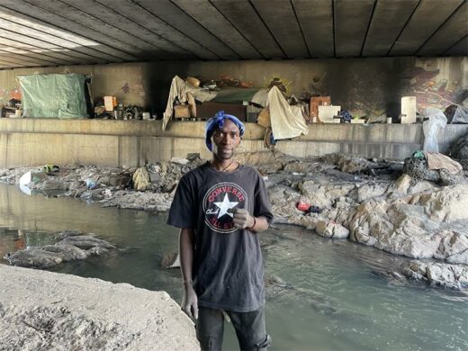 Thabang Moketi (38), who has been living under the Katherine Street Bridge for a year, says unemployment led him to seek shelter there and that recycling has become his source of income. Photo: Xoliswa Zakwe