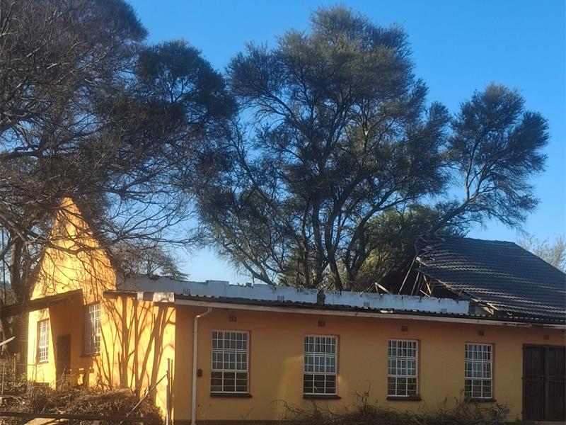 Demolition of the long-abandoned Berario Scout Hall is currently stalled by delayed utility disconnections, leaving frustrated residents waiting for safety concerns to be addressed.