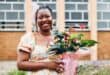 Ayanda Ndlovu at UJ Academy as she holds flowers she was gifted on October 10, 2026. Photo: Neo Phashe