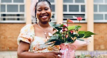 Ayanda Ndlovu at UJ Academy as she holds flowers she was gifted on October 10, 2026. Photo: Neo Phashe