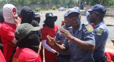 Officers tries to negotiate with the masked EFF protesters on October 26, 2026, at UJ APK Campus Photo: Waydon Jacobs