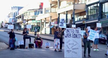 Melville residents take to the streets following weeks without reliable water supply on October 28, 2026, on 4th Avenue and Main Road. Photo: Neo Phashe