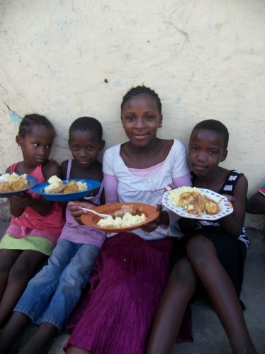 Enjoying a hearty meal at Siphiwe Soup Kitchen.