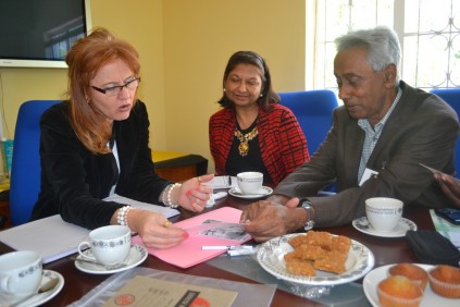 5. Luthuli Museum marketing director Heidi Gibson pores over photographs with Betty # and professor Jairam Reddy. 