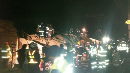 Rescuers being teamed with dog handlers for the search.