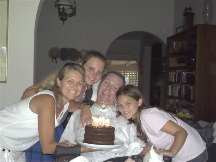 Former polo player Nick Rey with his wife Gayle and daughters.