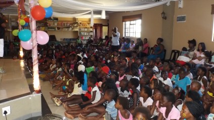 Children enjoy the show at the Kidz Club party on Saturday.