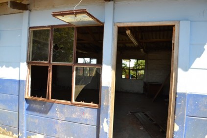 Most of the school's windows are broken and need a fresh coast of paint.