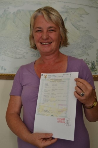 A relieved Bess Morgan with her new and correct unabridged marriage certificate. 