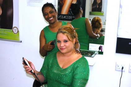 Ashleigh Dawn Naiker and hair dresser Shanon Oberholzer with clippers out and ready for the Shavathon.