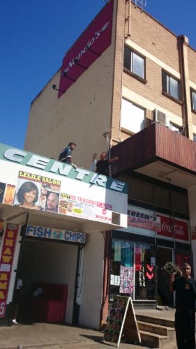 Paramedics up on the roof to assist the injured workers.