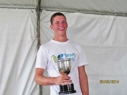 RIGHT: A smiling Travis Wilson with his trophy. Photo: Anthony Grote/Gameplan Media
