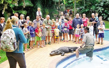 Crocodile Creek’s Sean LeClus talks to visitors at the Dolphin Holiday Resort.