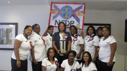 Nurses from the medical ward receive the trophy for best patient care.