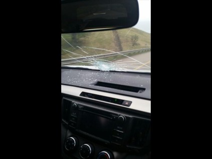 Suzanne van der Merwe's smashed windscreen after a rock or brick was dropped on to it from a bridge.