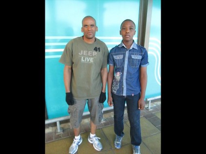 Themba Mabizela with his son Gift spend Youth Day at the Ballito Juction.