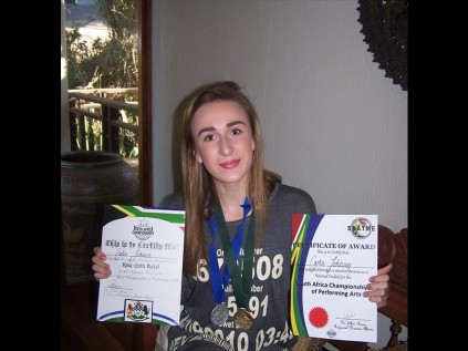 Carla with her gold and silver medals. 