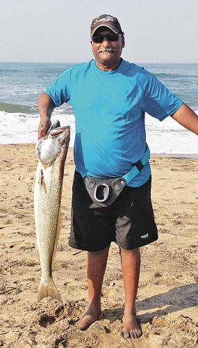 Dhinesh Laldas with his 7kg geelbek salmon caught at Tugela north bank in July. The fish was caught on a live mullet.