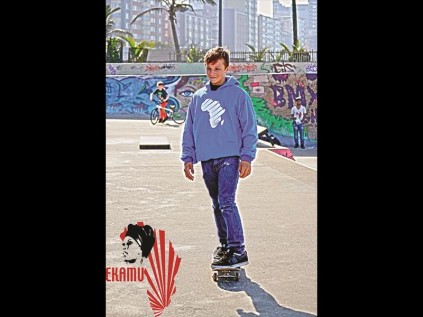 Cameron Miller setting the trend in a blue Ekamu hoodie.