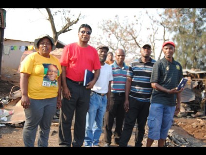 Monica Nobesuthu councillor Michael Abraham, Juza Mfunelwa, Fana Duma, Maxwell Nduge and Vincent Khanyile on the day of the fire disaster. 