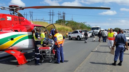 The critically injured patient is loaded into the EMRS chopper. Photo: IPSS Medical Rescue