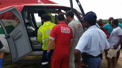 IPSS Medical Rescue loading the patient into the helicopter. Photo: IPSS Medical Rescue