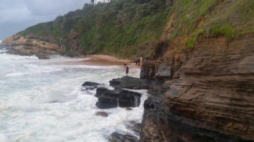 The spring high tide submerged the beach at Thompson's Bay and trapped 11 swimmers. Photo: Goolam Mohamed/Netcare911
