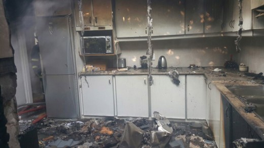 The damage in the kitchen where the fire started. Photo: IPSS Medical Rescue