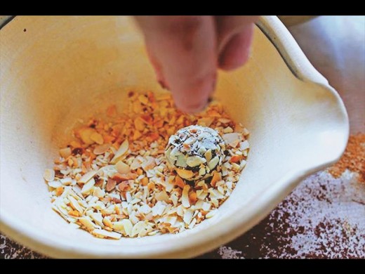 Roll the chocolate balls in flaked almonds or any toppings of your choice.