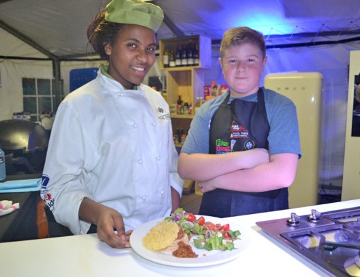 One of the International Hotel School students with Fine Young Cooks contestant Matthew Wocke showing off their dish.