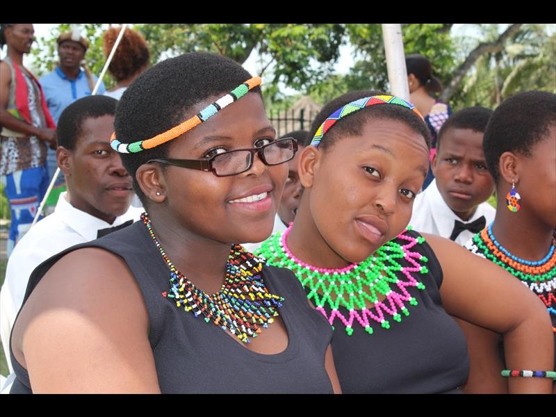 Thuliswa Manala and Moxolo Mashaba wearing their traditional beads with beaming smiles.