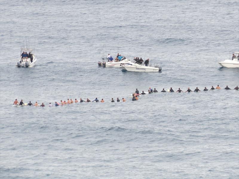 A moving tribute took place at sea over Tiffany's Reef as the family, boating and surfing locals gathered to say their final farewell.