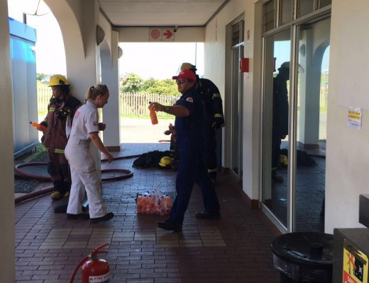 Paramedics refeuling the firemen with cold drinks. Photo: IPSS Medical Rescue