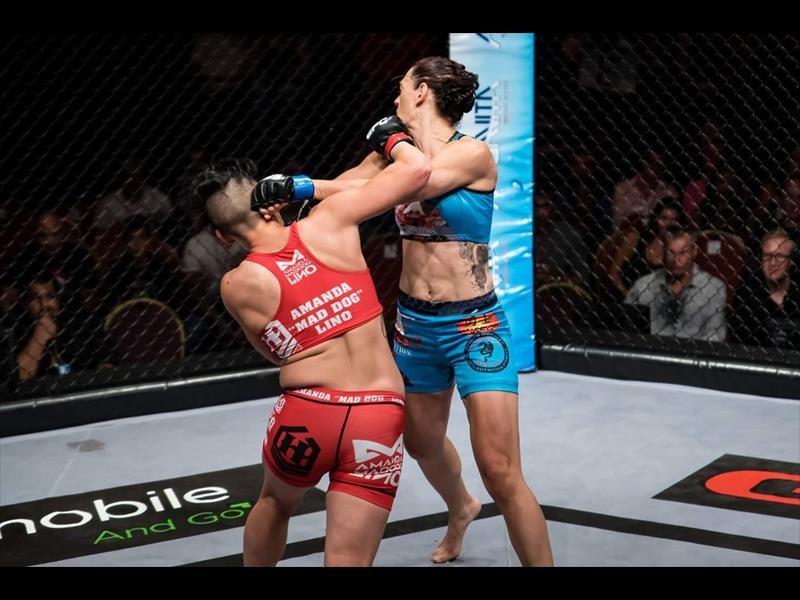 The writing was on the wall when Lino landed a straight right on Trosee's jaw that sent her tumbling to the mat.