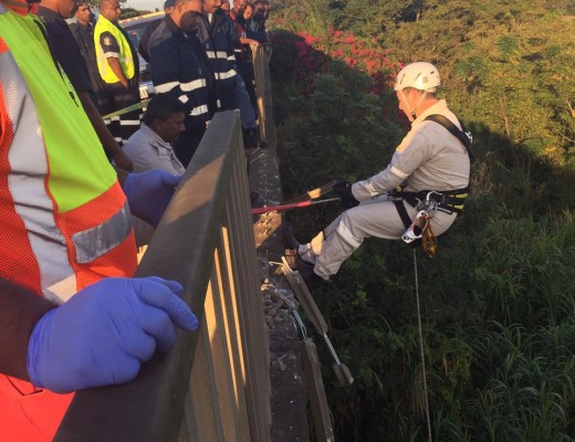 Paramedic Paul Herbst prepares to be lowered off the bridge. Photo: IPSS Medical Rescue