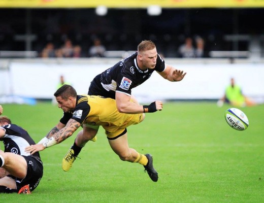 Jean-Luc du Preez and a Hurricanes player kris-cross in the air as they go for the ball from different angles. Photo: Jacqueline Herbst
