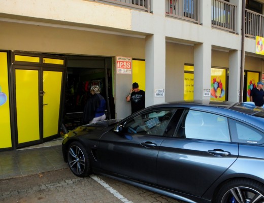 This BMW crashed through the Mad Hatters Party Shop window earlier this morning.