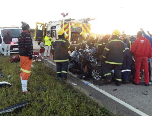The Kwadukuza fire department and IPSS Medical Rescue removing the three entrapped passengers from the blue vehicle.