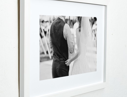 The contemporary framed photo uses a deep, slightly textured frame profile available in glossy white.