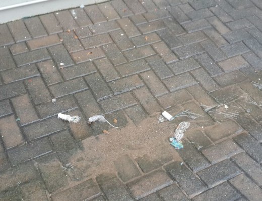 The courtyard was filled with tampons and other used sanitary products after the heavy rain. 