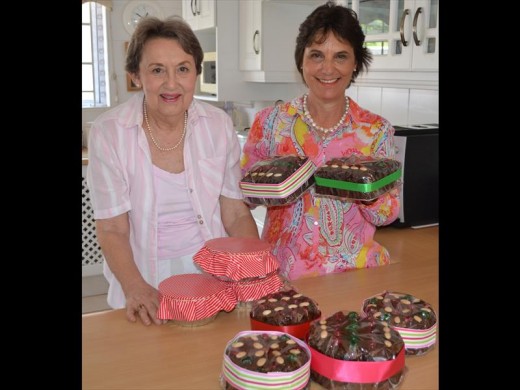 Christmas Country Fair preparations are in full swing particularly those responsible for the puddings and cakes. Two busy ladies are Marydearne Boyce with her Christmas puddings and Gaby Lyle with her Christmas cakes.