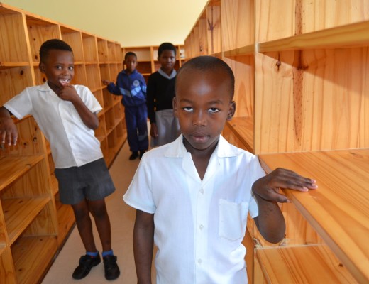 Nhlakanipho Zungu (7), Luphe Cala (7) and (back) Sthabile Bhila (8) and Nomvula Mthembu (7) are hungry for knowledge - in their empty school library.