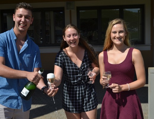 Benjamin Habig, Emma Perkins and Natasha Henning - three of Ashton's top performers - celebrate their results.