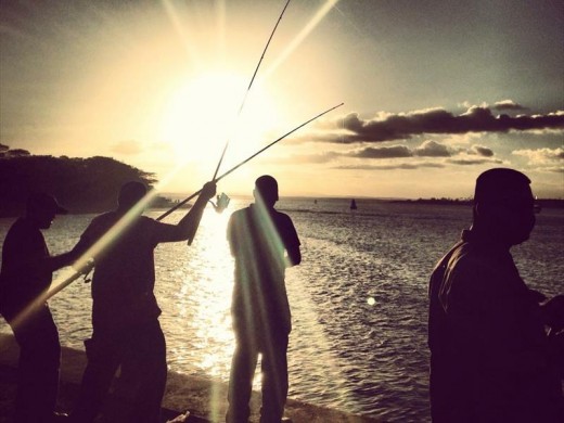 Kriben Naidoo took fourth place with this powerful silhouette of fishermen at Richard's Bay pier.