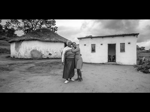Sinethemba Dlamini at home with her mother, Ntombizethu Dlamini. Photo: Emil von Maltitz